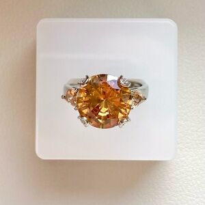 Orange Solitaire Ring with Accent Stones